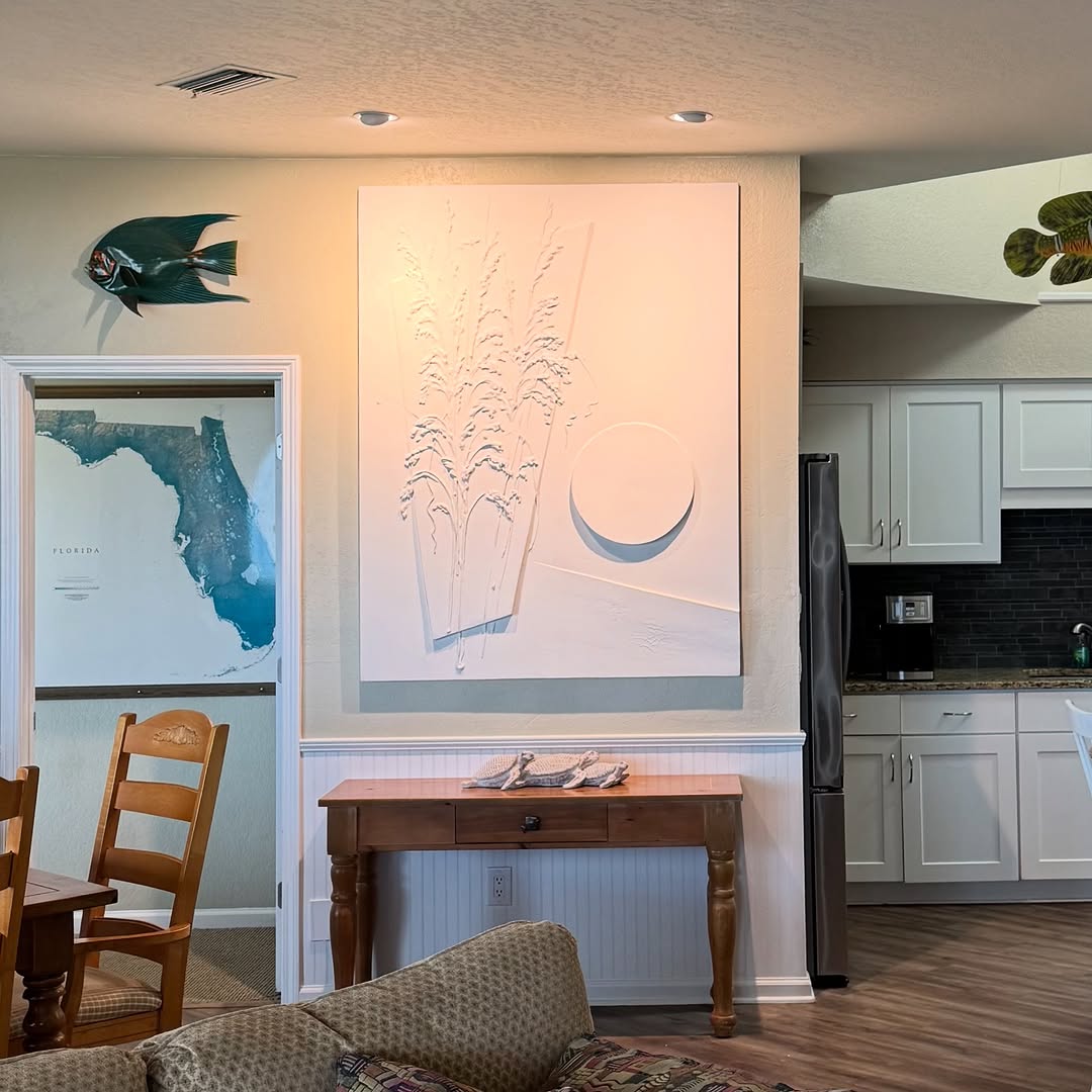 Sea oats relief panel for an entryway
